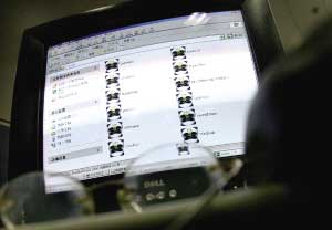 科技时代_特别报道:“熊猫烧香”考问网络安全